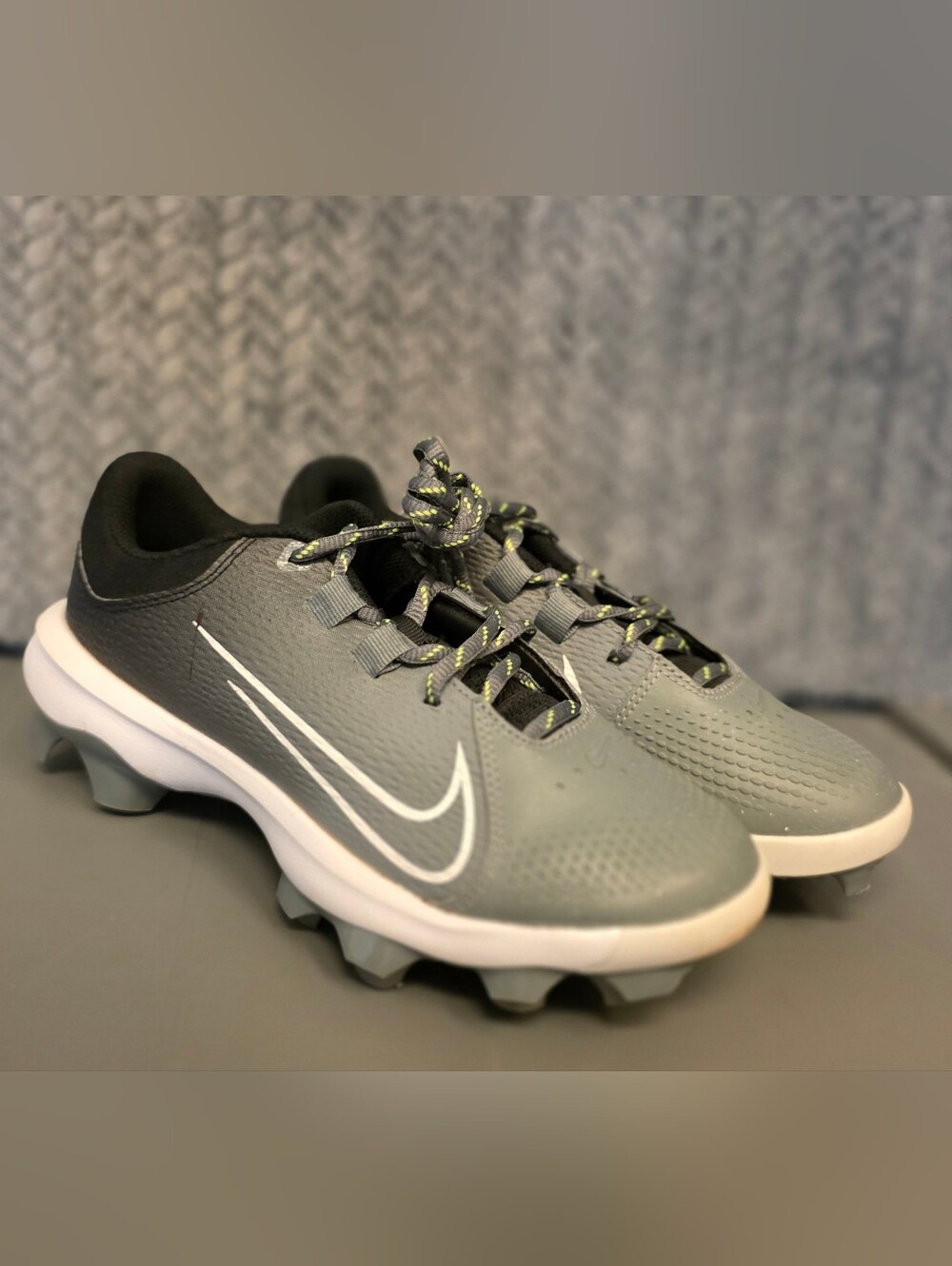 Nike Women's Gray Athletic Cleats with White Swoosh and Neon-Accent Laces